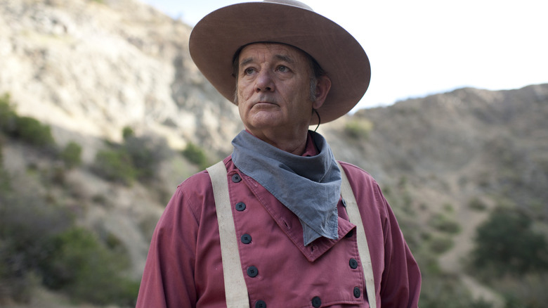 Saul strikes a pose in "A Glimpse Inside the Mind of Charles Swan III" (2013)