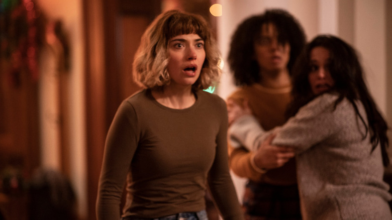 Riley Stone stumbling onto a shocking scene in Black Christmas (2019)