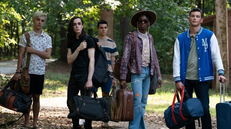 Campers arriving to be "converted" in They/Them (2022)