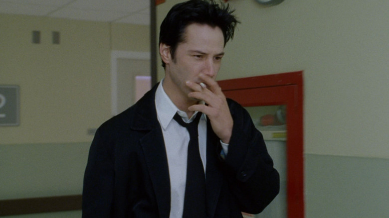 John Constantine walking down a hallway in Constantine (2008)