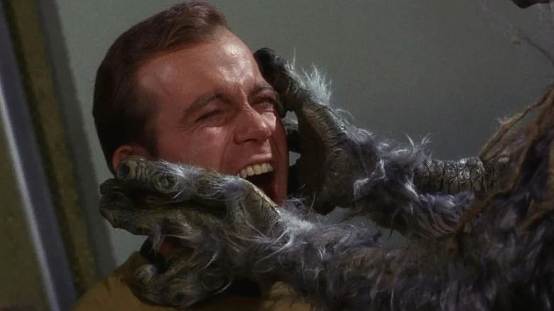 A monster grabbing Captain Kirk's face on Star Trek: The Original Series