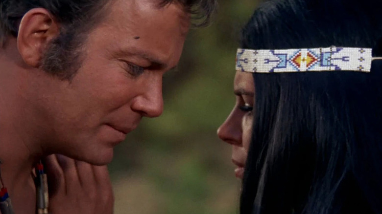 Captain Kirk and Miramanee having a tender moment on Star Trek: The Original Series