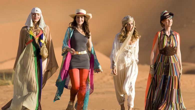 Carrie, Miranda, Charlotte, and Samantha wander through the desert in "Sex and the City 2" (2010)