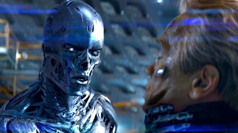 A cyborg chokes the Terminator in "Terminator Genisys" (2015)