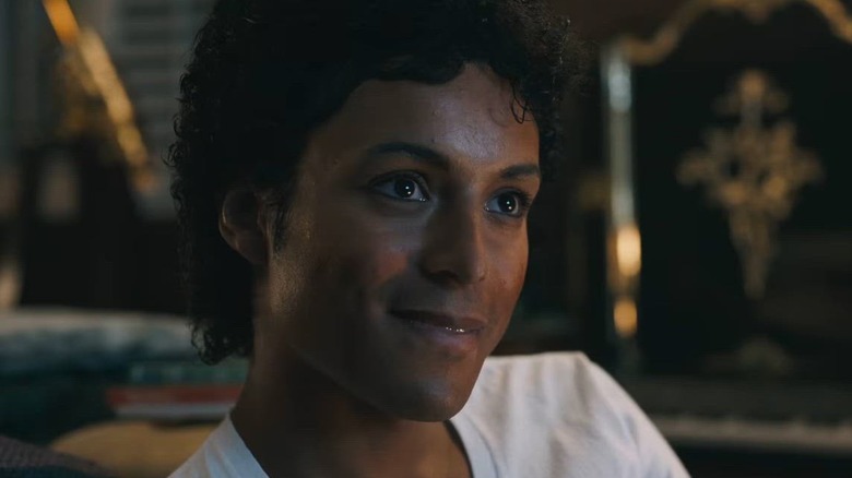 Michael Jackson smiling in a white t-shirt in Michael (2026)
