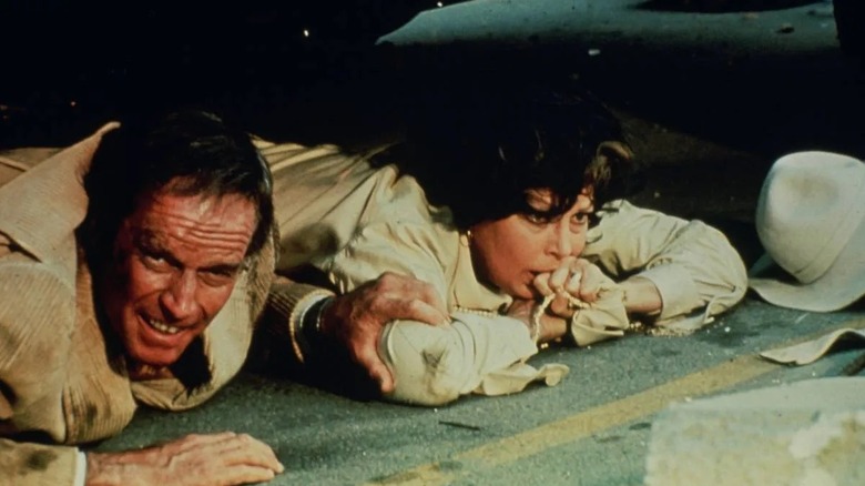 Characters hiding out from the trembling Earth in Earthquake (1974)