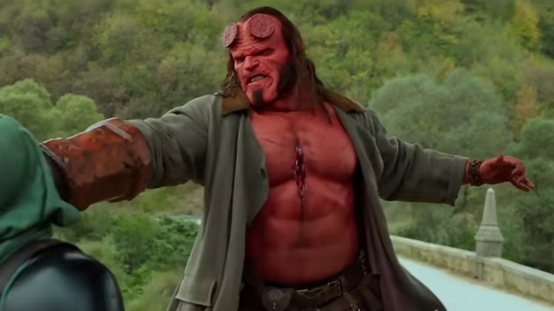 Hellboy going up against a witch in Hellboy