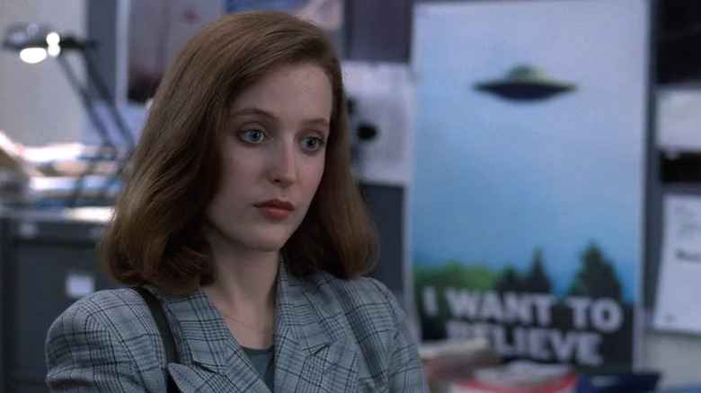 Dana Scully looking forward in her basement office on The X-Files (1993-2018)
