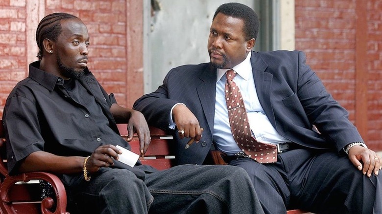 Omar Little talks to Detective Bunk Moreland on a bench in "The Wire" (2002-2008)