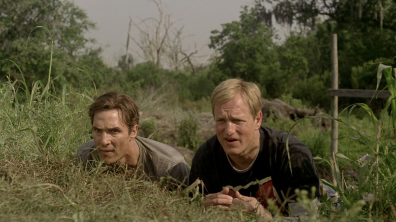 Detectives Rust Cohle and Marty Hart hide in the grass in "True Detective" (2014-present)