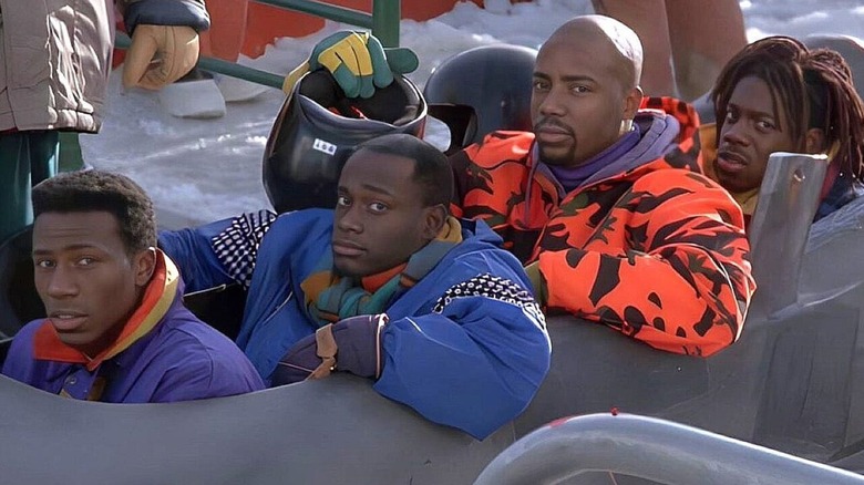 Derice, Junior, Yul, and Sanka prepare for a sled race in Cool Runnings (1993)