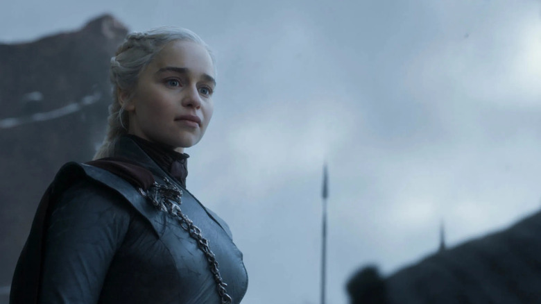 Emilia Clarke as Daenerys Targaryen looks concerned in Game of Thrones.