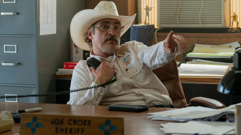 Joe Cross on the phone in Eddington (2025)