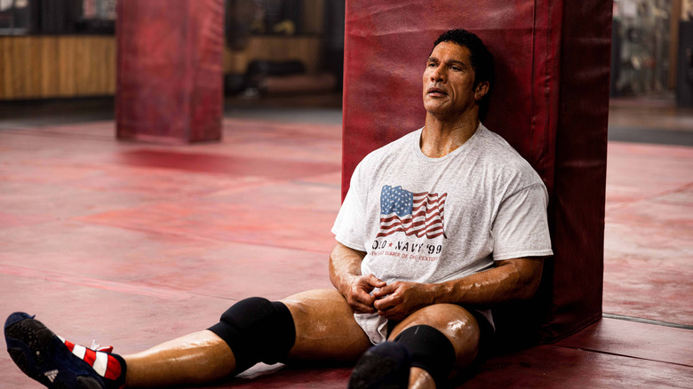 Mark Kerr resting in between training sessions in The Smashing Machine (2025)