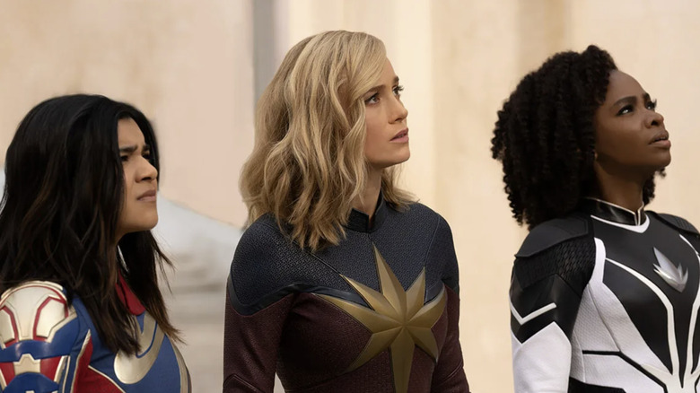 Kamala, Carol, and Monica look up in "The Marvels" (2023)