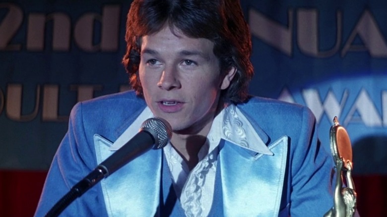Dirk Diggler accepting an award onstage