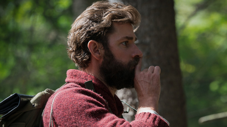 Lee putting his finger to his mouth in A Quiet Place (2018)