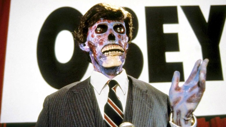 An alien anchor reads the news in 