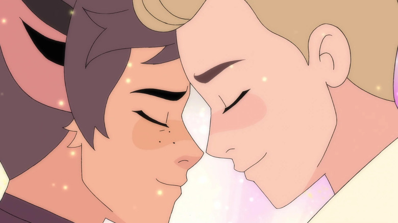 Catra and Adora lean their heads together in "She-Ra and the Princesses of Power"