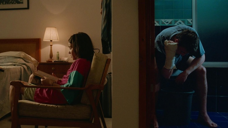 Sophie and Calum process life apart in their hotel room in "Aftersun" (2022)