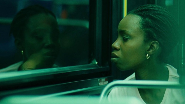 Alike stares out a bus window in "Pariah" (2011)