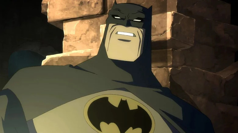 An aged Batman appears in a spotlight in Batman: The Dark Knight Returns - Part 1 (2012)