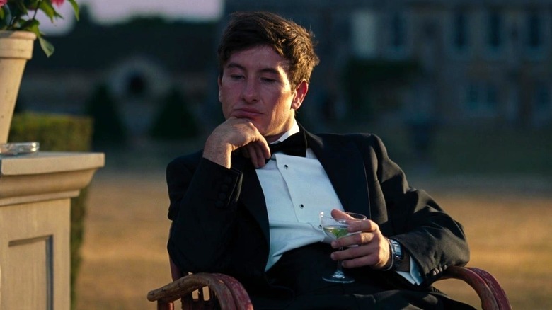Barry Keoghan's Oliver Quick sitting down in Saltburn