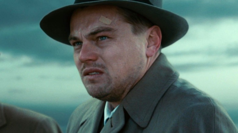 Leonardo DiCaprio's Teddy Daniels staring into the distance in Shutter Island