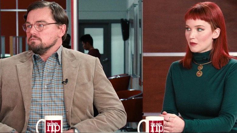 Randall Mindy and Kate Dibiasky appear on a talk show in "Don't Look Up" (2021)