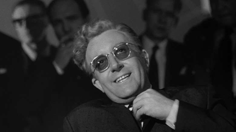Dr. Strangelove grins in the War Room in "Dr. Strangelove" (1964)