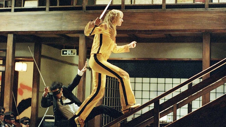 The Bride runs up a banister in "Kill Bill: Volume 1" (2003)