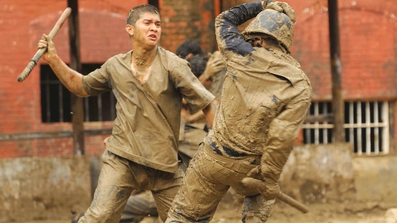 Rama fights in the mud in "The Raid 2" (2011)