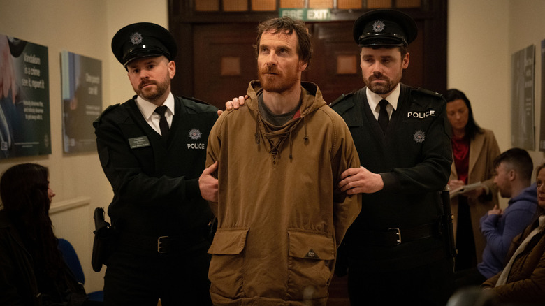 Arlo escorted by police in Kneecap