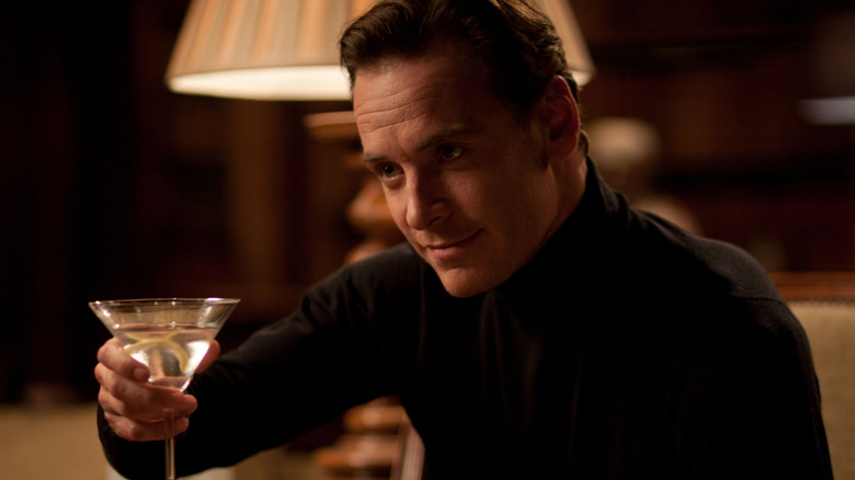 Erik lifting martini glass in X-Men: First Class