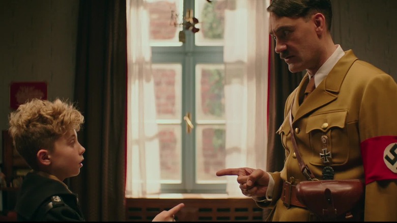 Jojo and Adolf Hitler plan a scheme in "Jojo Rabbit" (2019)