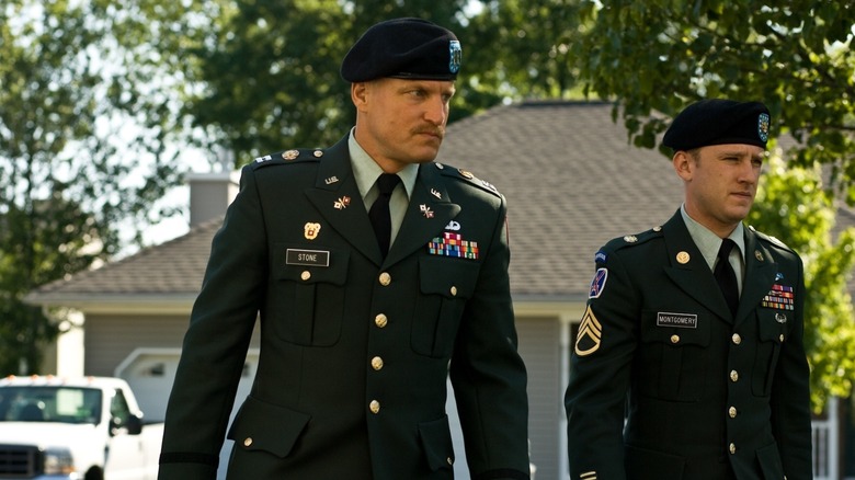 Tony Sloane and Will Montgomery head to a house in "The Messenger" (2009)