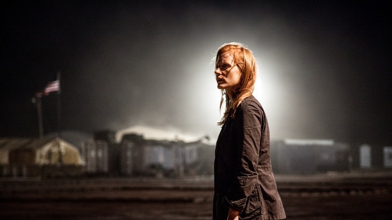 Maya stands outside on a base in "Zero Dark Thirty" (2012)