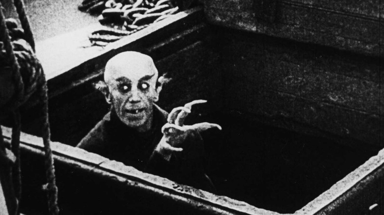 Count Orlok emerges from a ship's hold