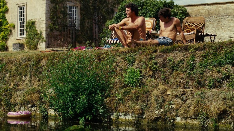 Felix (Jacob Elordi) and Oliver lounging in the sun