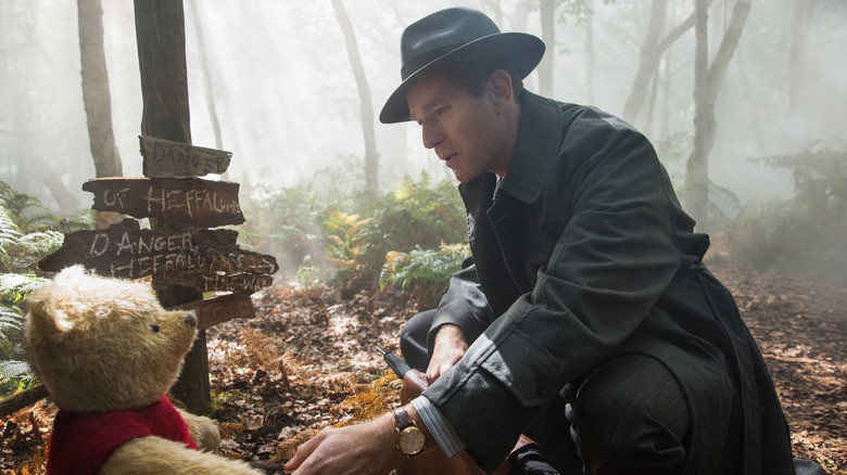 Adult Christopher Robin meeting Winnie in Christopher Robin