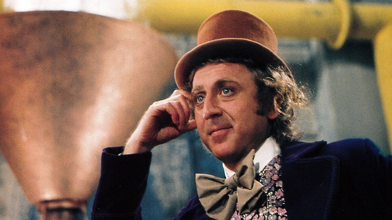 Willy Wonka holding hand to head in Willy Wonka and the Chocolate Factory