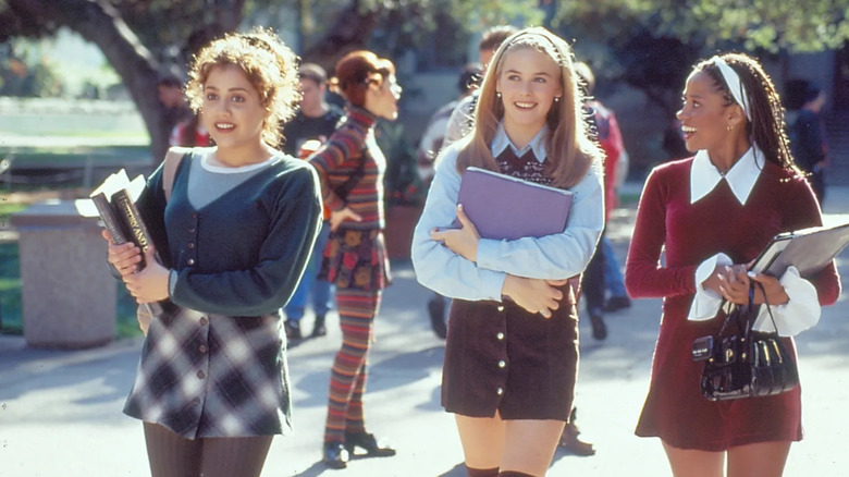 Tai walking in front of Cher and Dionne in Clueless