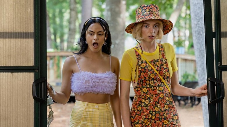 Drea and Eleanor walking into a building shocked in Do Revenge
