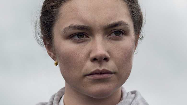 Florence Pugh stares