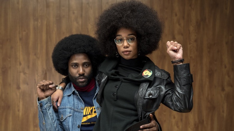 Ron Stallworth and Patrice exhibit the Black Power symbol in "BlacKkKlansman" (2018)