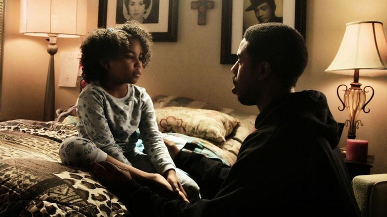 Oscar Grant talking to his daughter in "Fruitvale Station" (2013)