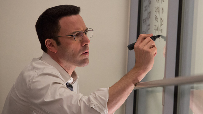 Christian Woolf calculating numbers in "The Accountant" (2016)