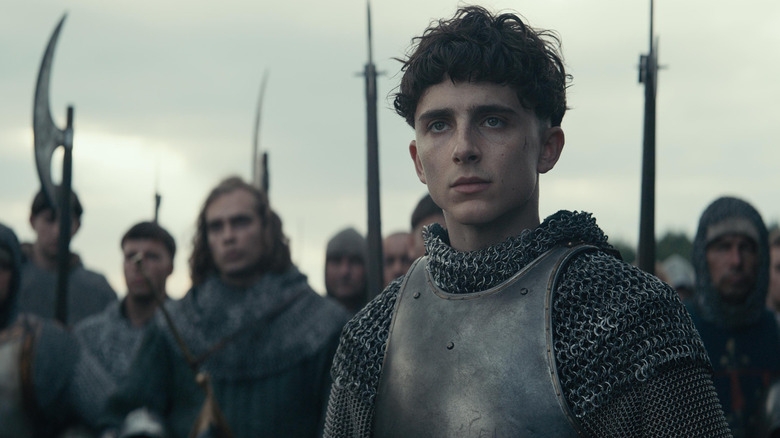 Prince Hal stands in front of an army in The King