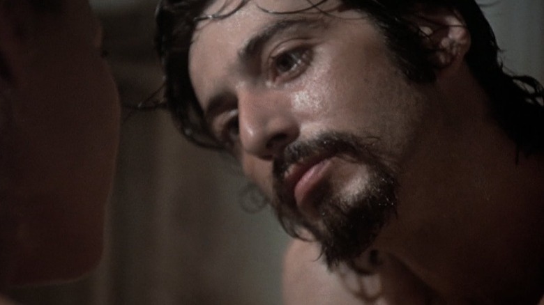 Frank Serpico sitting in a bathtub and talking to Leslie in "Serpico" (1973)