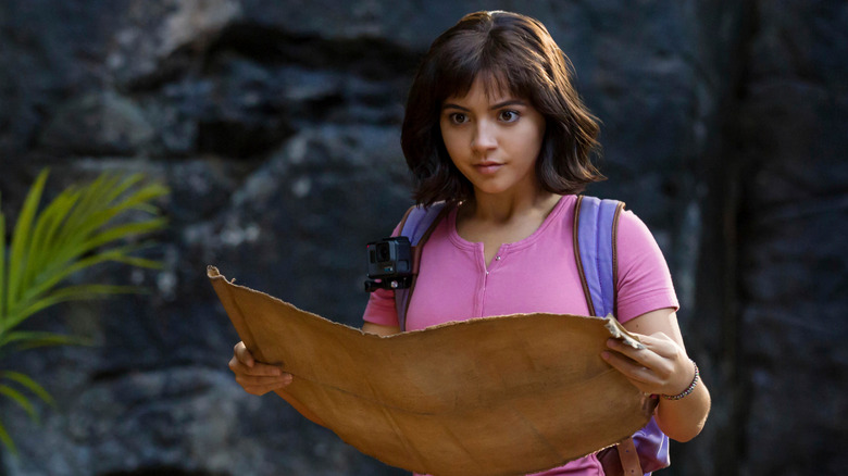 Dora reading her map in Dora and the Lost City of Gold (2019)